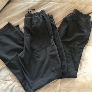 Two black scrub pants